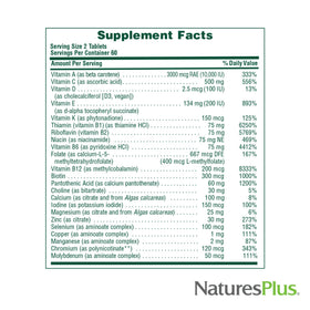 NaturesPlus Source of Life Men comprimés sur une surface en bois
