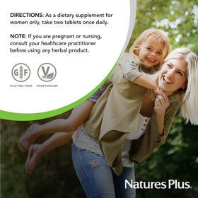 NaturesPlus Source of Life Women comprimés sur une table en bois