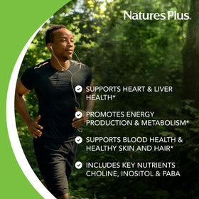 NaturesPlus Super B-50 capsules sur une cuillère en bois