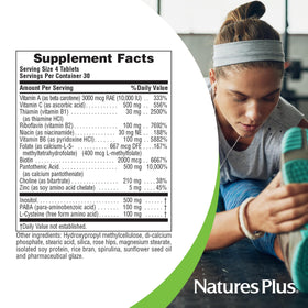 NaturesPlus Ultra Hair comprimés avec emballage sur fond neutre