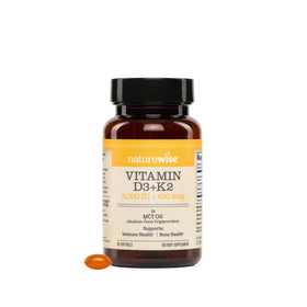 NatureWise D3 5000 IU + K2 200 mcg gélules molles vegan devant une boîte