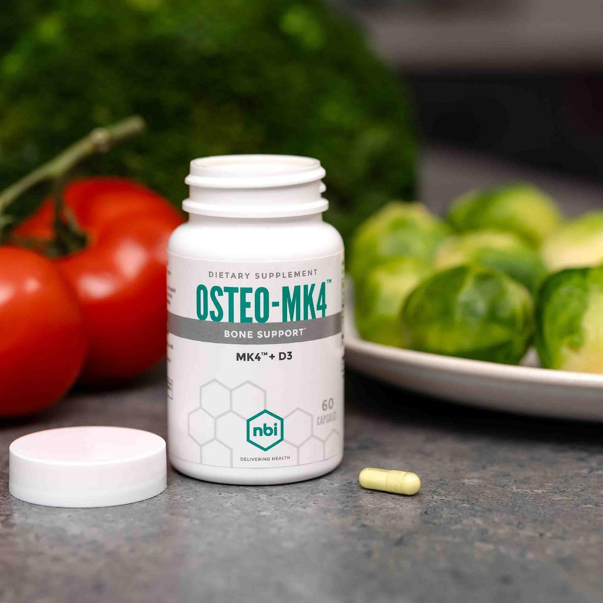 NBI Osteo-MK4 60 Capsules avec un fond de nature