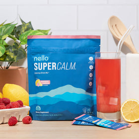 Nello Supercalm Poudre à Boire présentation sur une table