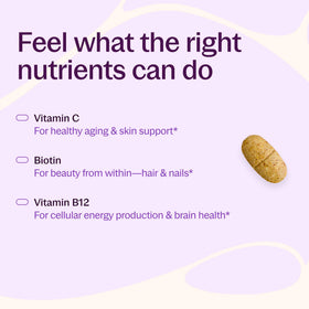 New Chapter Multivitamine Femme 40+ comprimés dans une main
