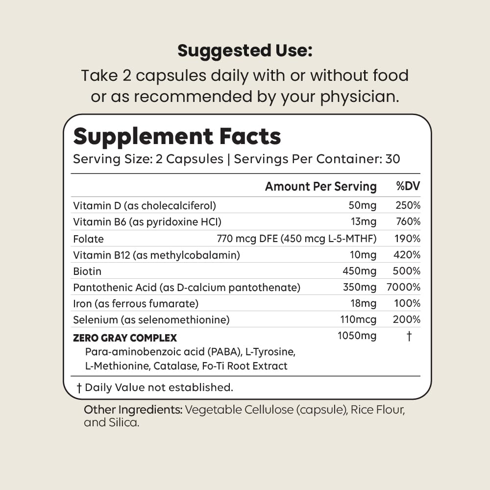 Newt ZERO GRAY™ capsules à côté d'un verre d'eau