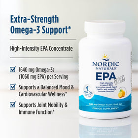 Nordic Naturals EPA Xtra gélules avec un citron en arrière-plan