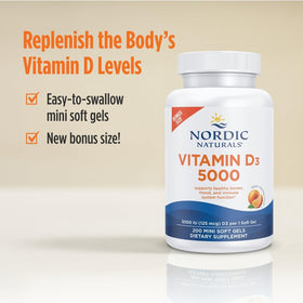 Nordic Naturals Vitamine D3 5000 IU 200 mini gélules orange - gélules sur une cuillère