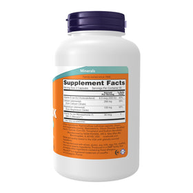 NOW Foods Cal-Mag DK capsules sur une table