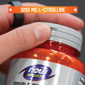 NOW Foods L-Citrulline Extra Fort 1200 mg comprimés à côté d'un verre d'eau