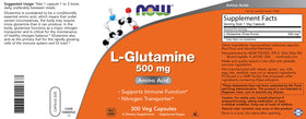 NOW Foods L-Glutamine 500 mg capsules on a wooden table
