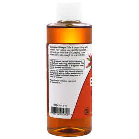 NOW Foods Vitamine E Liquide 4 oz sur une table