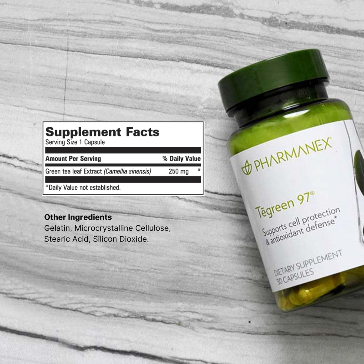 Nu Skin Tēgreen 97 exposé sur une table en bois