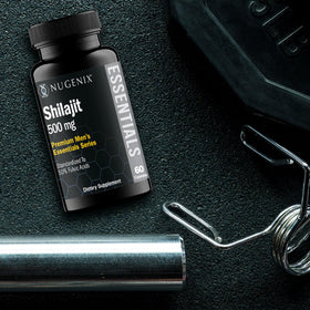 Nugenix Shilajit capsules with a measuring spoon