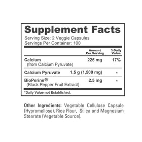 NusaPure Calcium Pyruvate 1500mg 200 capsules à côté d'un verre d'eau
