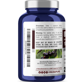 NusaPure Cerise Noire capsules végétales dans une main