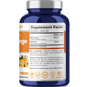 NusaPure Orange Amère 500mg capsules ouvertes montrant la taille