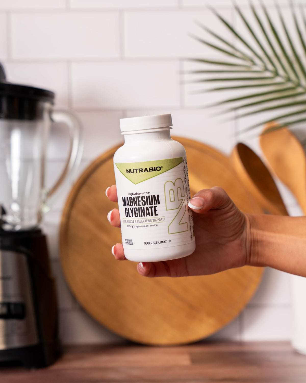 NutraBio Magnésium Glycinate capsules sur une table
