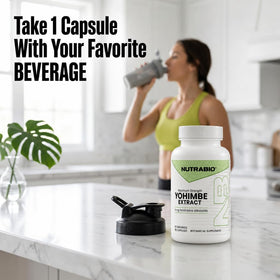 NutraBio Yohimbe flacon en mains avec des capsules