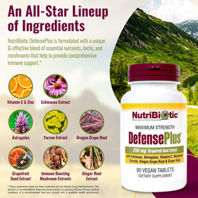 NutriBiotic DefensePlus 90 comprimés sur une table avec des ingrédients naturels