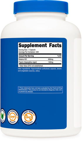 Nutricost Betaine HCl + Pepsin capsules sur une table