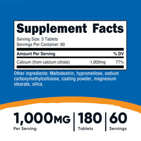 Nutricost Citrate de Calcium comprimé sur une surface blanche