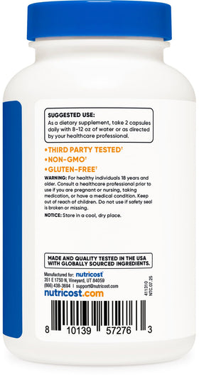 Nutricost Extrait de Tribulus Terrestris 1500mg capsules à côté d'un verre d'eau