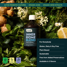 Nuzest Inner Biome Blend avec fruits et herbes en arrière-plan