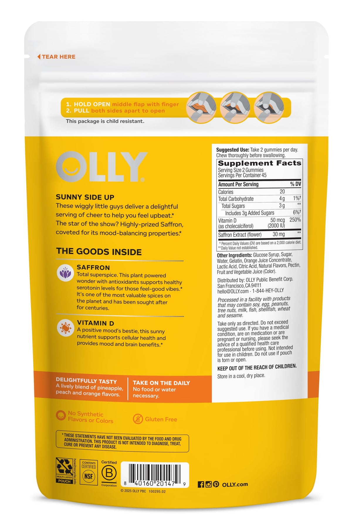 OLLY Hello Happy Gummies, deux gummies sur une table en bois