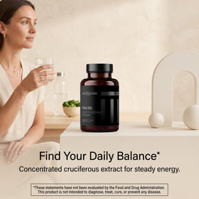 Olympian Labs DIM 150mg capsules on a wooden table