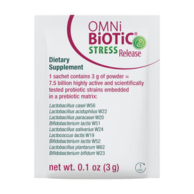 OMNi BiOTiC Stress Release sur une table avec des accessoires