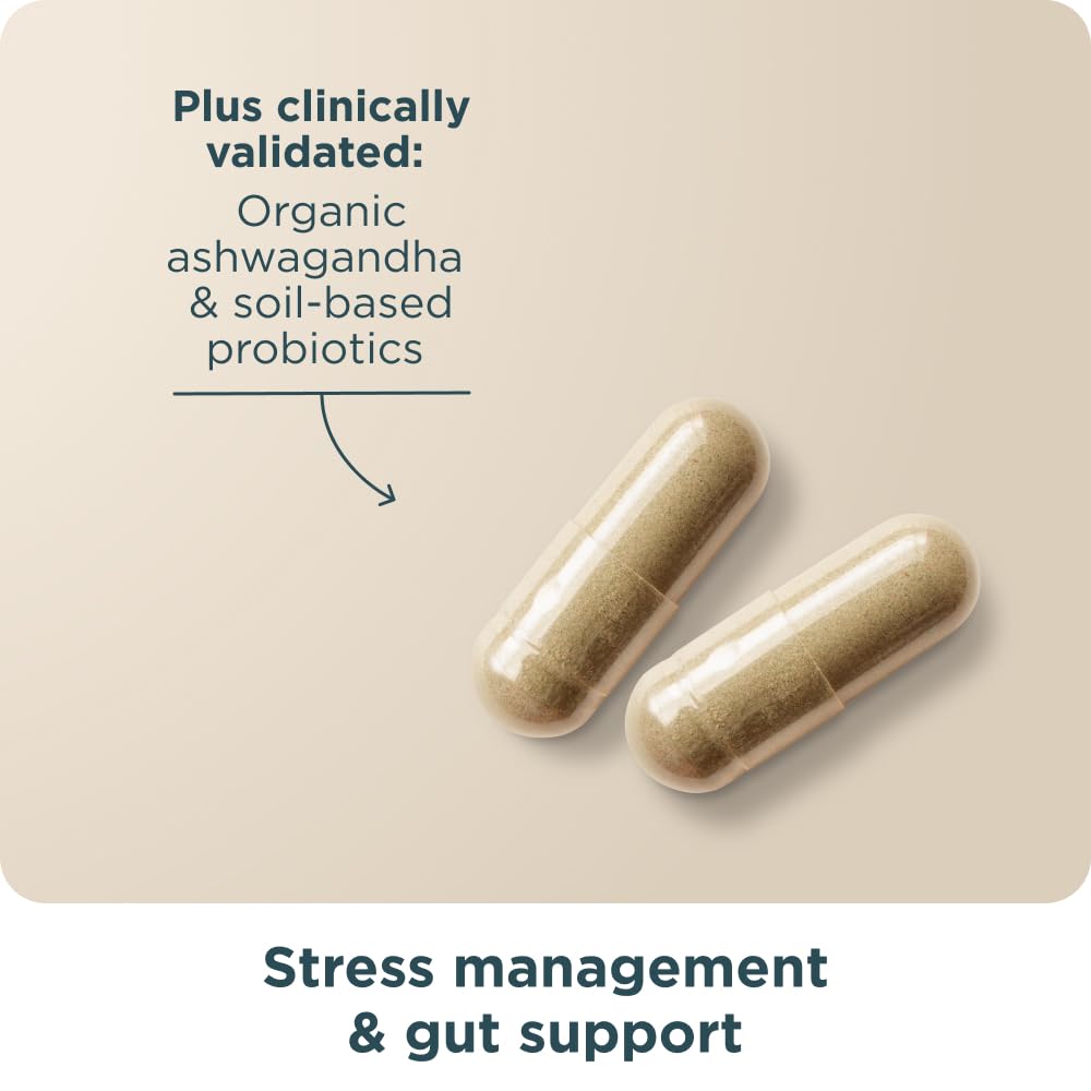 Open bottle of Ancient Nutrition magnesium capsules with some pills on the side