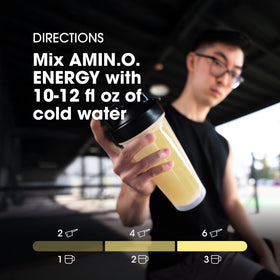 Optimum Nutrition Amino Energy Powder 372g Ananas à côté d'équipements de sport