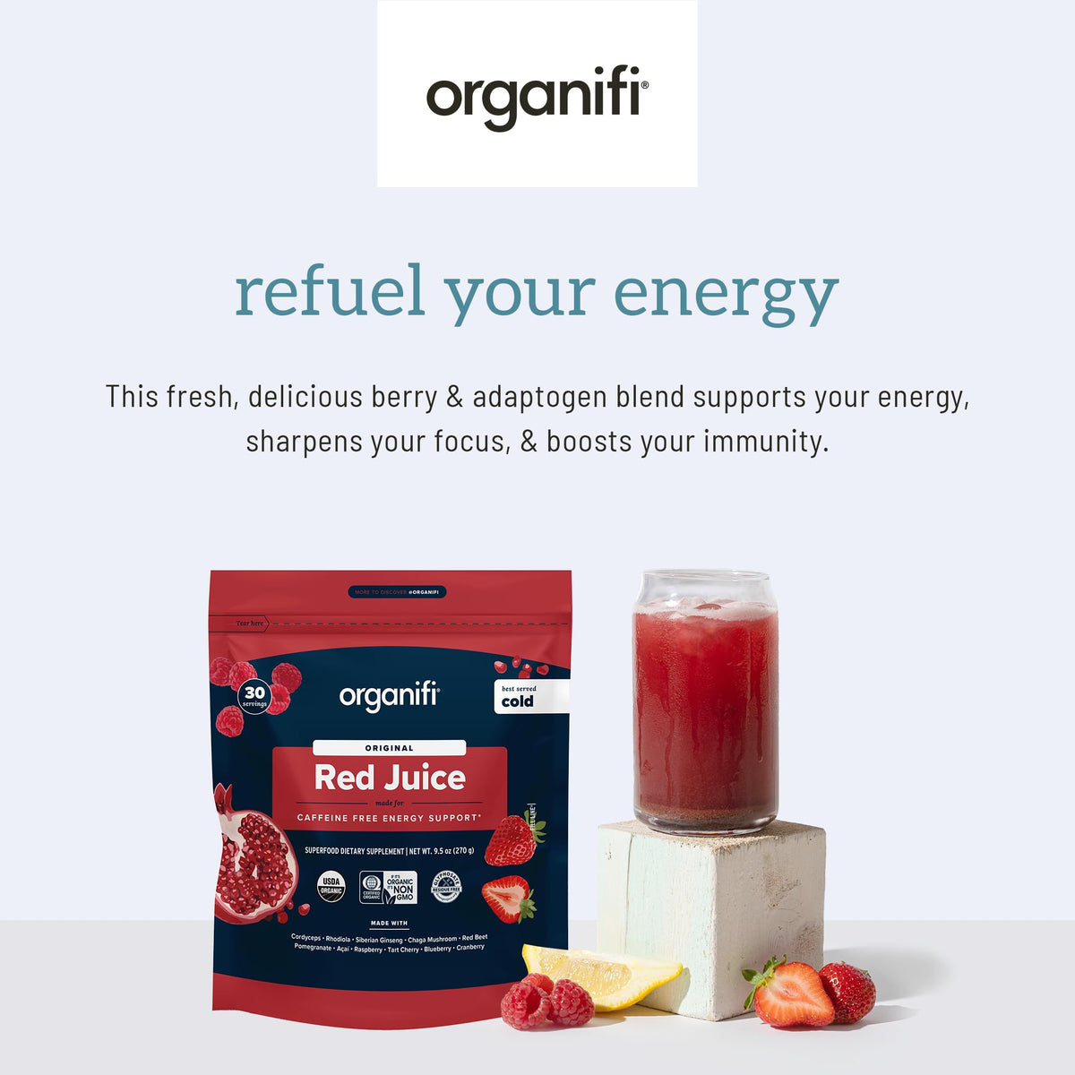 Organifi Red Juice en poudre mélangé dans un verre d'eau