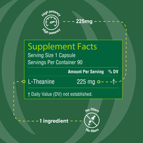 Organika L-Theanine capsules à côté d'un verre d'eau