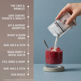 Organixx Collagen Peptides + Creatine powder in a glass
