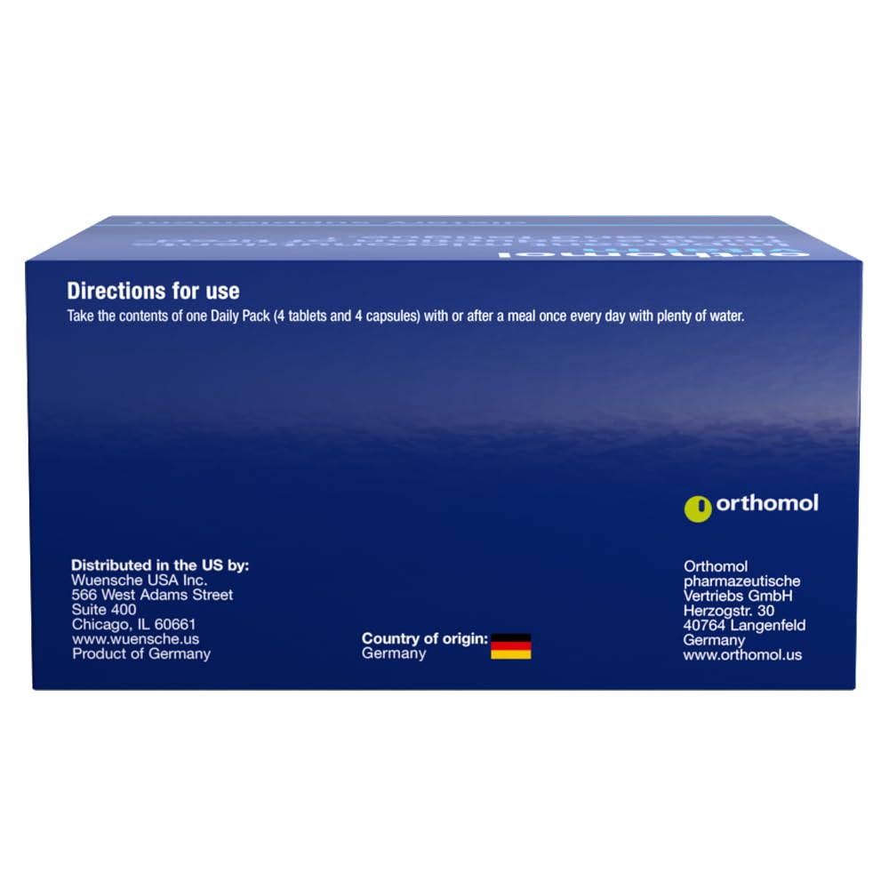 Orthomol Vital M Complément Multivitaminé pour Hommes, tablettes sur une surface blanche