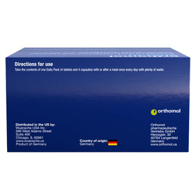Orthomol Vital M Complément Multivitaminé pour Hommes, tablettes sur une surface blanche