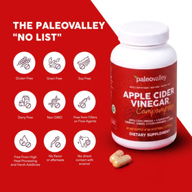 Paleovalley Vinaigre de Cidre de Pomme sur une table en bois