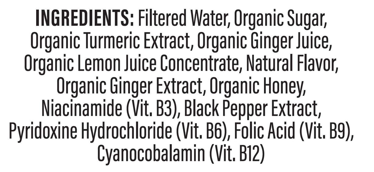 Personne tenant un shot de curcuma Turmeric Time