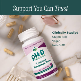 pH-D Capsules Créatine avec une main tenant le flacon