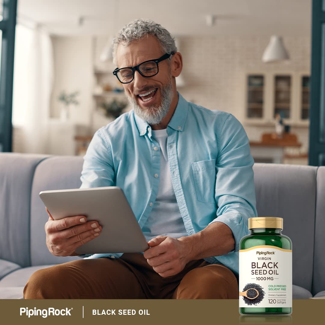 Piping Rock Huile de Graines Noires Capsules 1000mg sur table