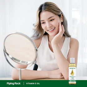 Piping Rock Huile de Vitamine E 5000 UI 118 ml sur une table