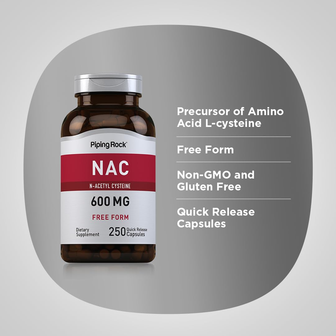 Piping Rock NAC N-Acétylcystéine 600mg capsules à côté d'un verre d'eau