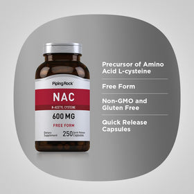 Piping Rock NAC N-Acétylcystéine 600mg capsules à côté d'un verre d'eau