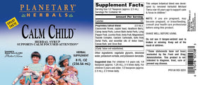 Planetary Herbals Calm Child Sirop Herbacé 240ml à côté d'un verre d'eau