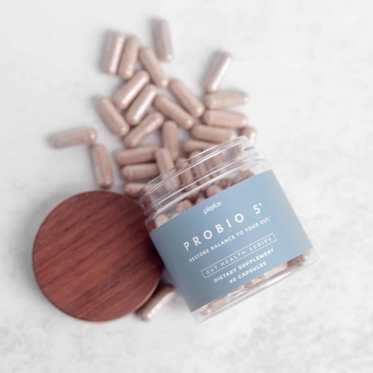 Plexus ProBio 5® capsules ouvertes montrant leur taille
