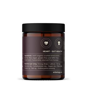 Pot de poudre d'aronia bio Erbology sur une table en bois