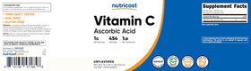 Poudre d'acide ascorbique Nutricost avec une cuillère doseuse