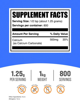 Poudre de carbonate de calcium BulkSupplements dans un bol avec cuillère