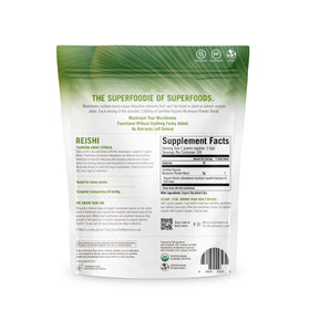 Poudre de champignon Reishi bio OM MUSHROOM SUPERFOOD dans un bol